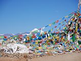 01 First View Of Mount Kailash With Prayer Flags We crested a small hill and a prayer flag festooned pole welcomed us to the first view of Mount Kailash.